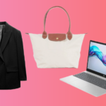 Afbeelding van een zakelijke laptopopstelling met een stijlvolle zwarte blazer en tas, die een professionele en moderne werkstijl uitstralen.